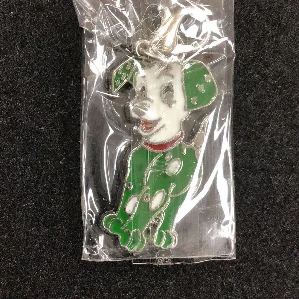 Charm, green, Dalmatian, Source unknown